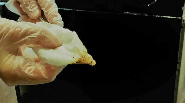 how to clean behind the stove