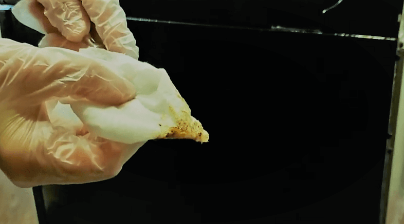 how to clean behind the stove