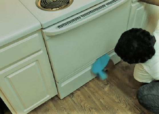 How to Clean Under the Stove