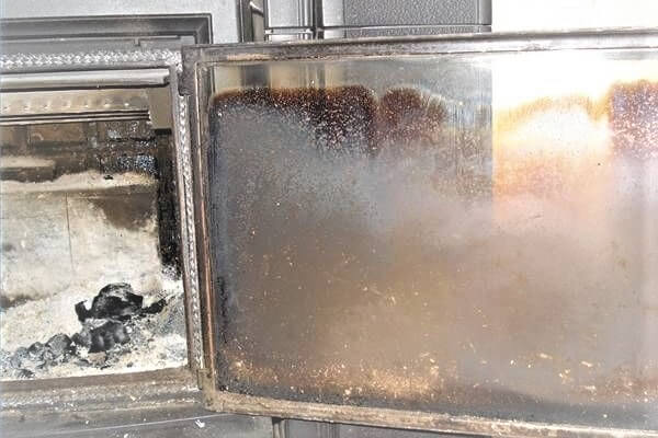 how to clean wood stove glass door 1
