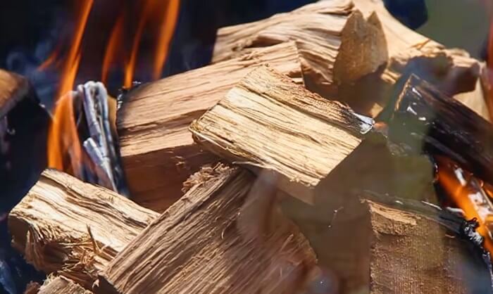 can-you-burn-wood-or-wood-pellets-in-a-charcoal-grill